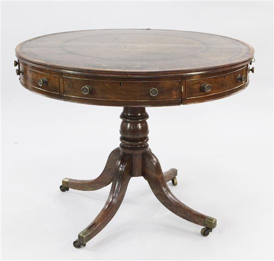 A George III mahogany drum top library table, H.2ft 6in. Diam.3ft 2in.